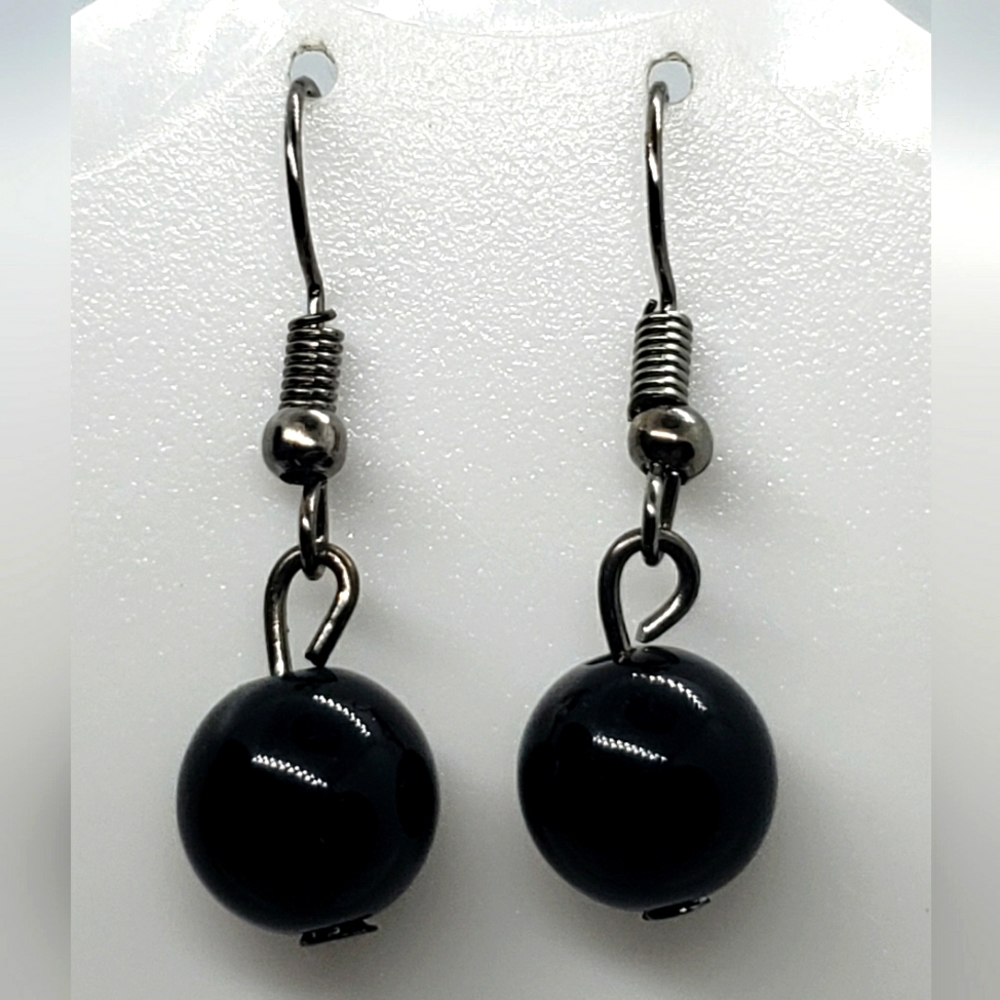 Woman black beaded earrings